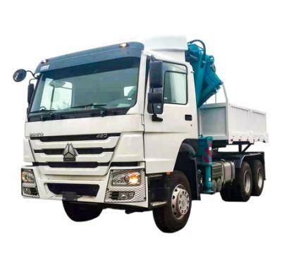 HOWO Tractor Boom Truck with 14 Tons Folding Crane